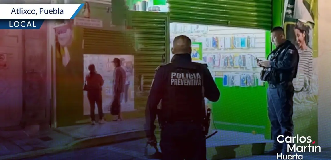 Violento asalto a tienda de celulares en Atlixco; deja un herido y dos detenidos