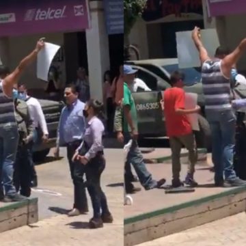 Silvano Aureoles empuja a manifestante; lo tacha de “halcón” y “provocador”