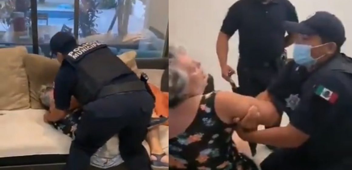 (VIDEOS) Policías someten a mujer de la tercera edad para desalojarla de casa en Cancún