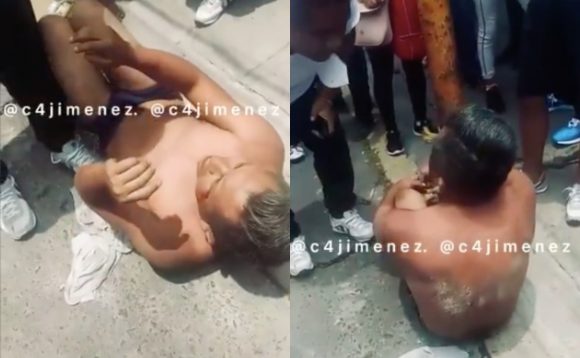 (VIDEO) Comerciantes en CDMX detienen a extorsionador; lo desnudan y golpean