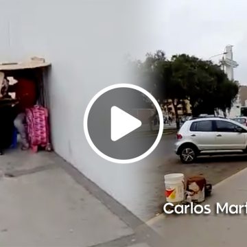 (VIDEO) Pequeña estudia bajo una caja de cartón mientras su papá trabaja de lava coches