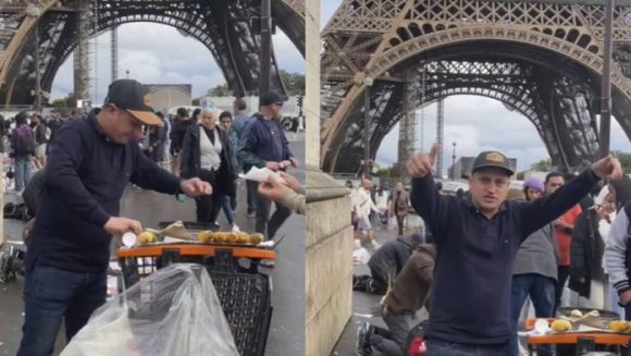 Venden elotes frente a la Torre Eiffel