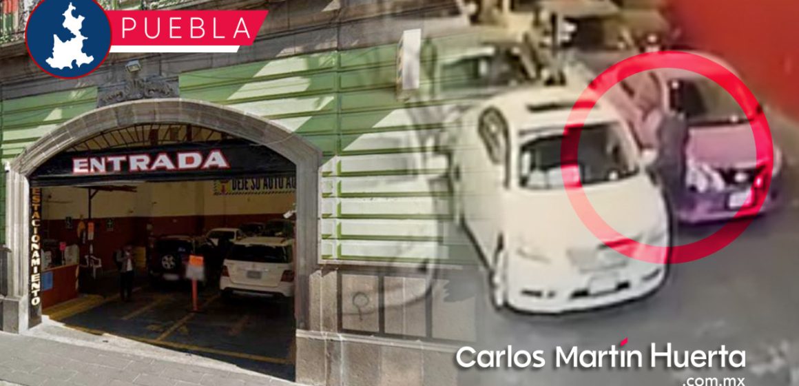 (VIDEO) Se roban coche de estacionamiento en Centro de Puebla; ladrón asegura perder su boleto