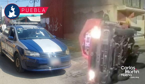 Patrulla de San Pedro Cholula protagoniza accidente; volteó a una camioneta