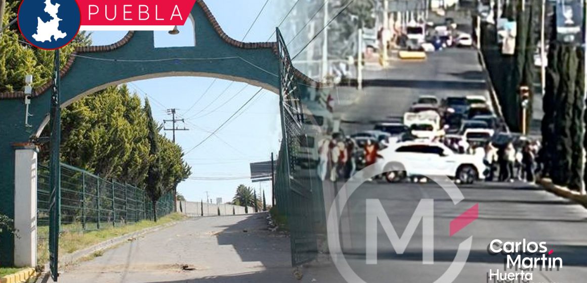 Bloquean la Calzada Zavaleta para impedir retiro de reja en Fraccionamiento la Concepción