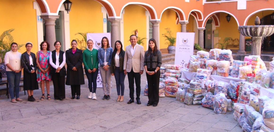 Voluntariado del Congreso entrega productos alimenticios reunidos en la carrera “Por Amor al Prójimo”