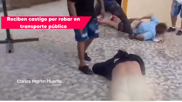 VIDEO Pareja de ladrones recibe tablazos por robar en transporte