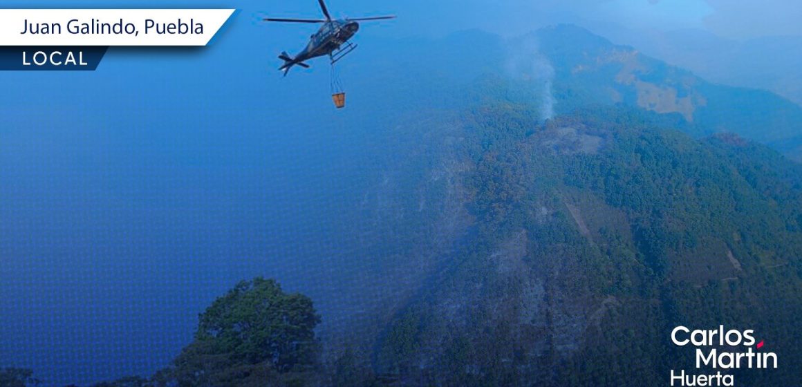 Con uso de helicóptero combaten incendio forestal en Juan Galindo