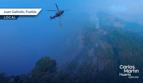 Con uso de helicóptero combaten incendio forestal en Juan Galindo