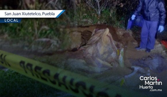 Encuentran cuerpo sepultado y envuelto en bolsas en Xiutetelco