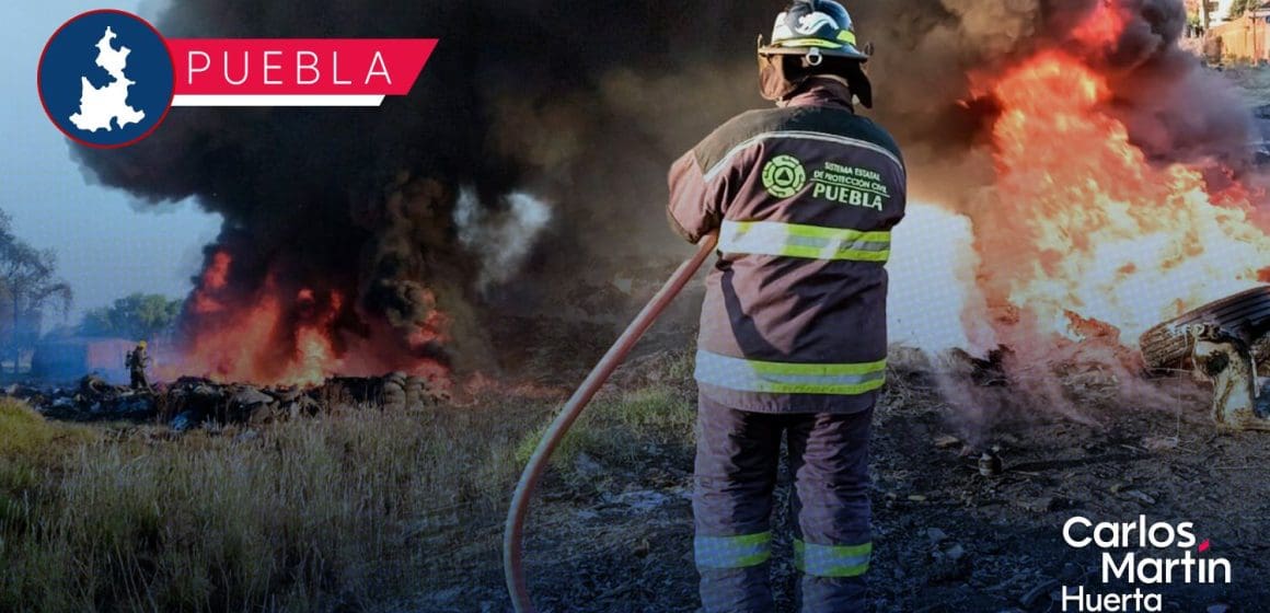 Quema de llantas en la México-Puebla provoca densa capa contaminante   