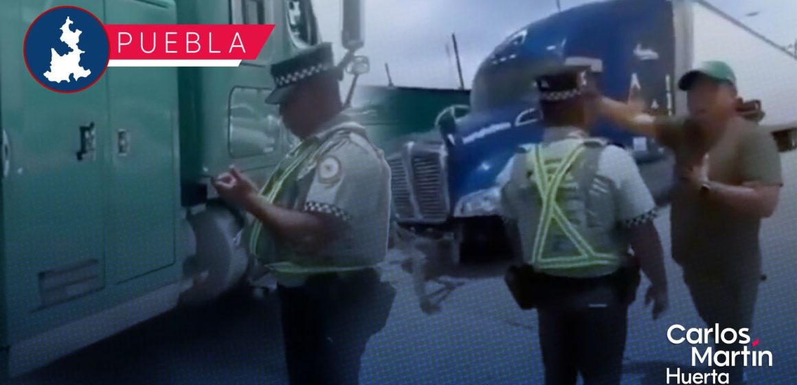 Balean a trailero en la autopista México-Puebla en intento de asalto: Guardia Nacional termina multándolo