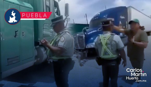 Balean a trailero en la autopista México-Puebla en intento de asalto: Guardia Nacional termina multándolo