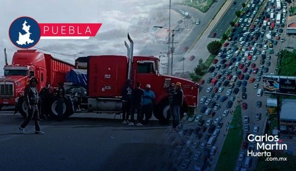 Caos en la Vía Atlixcáyotl: Transportistas de AMOTAC bloquean por inseguridad en carreteras