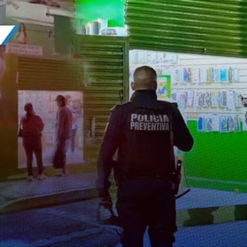 Violento asalto a tienda de celulares en Atlixco; deja un herido y dos detenidos