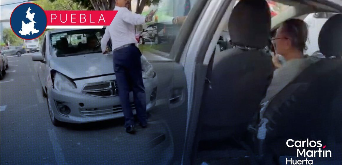 Chofer de plataforma huye con hombre en el cofre tras accidente en la 11 Sur