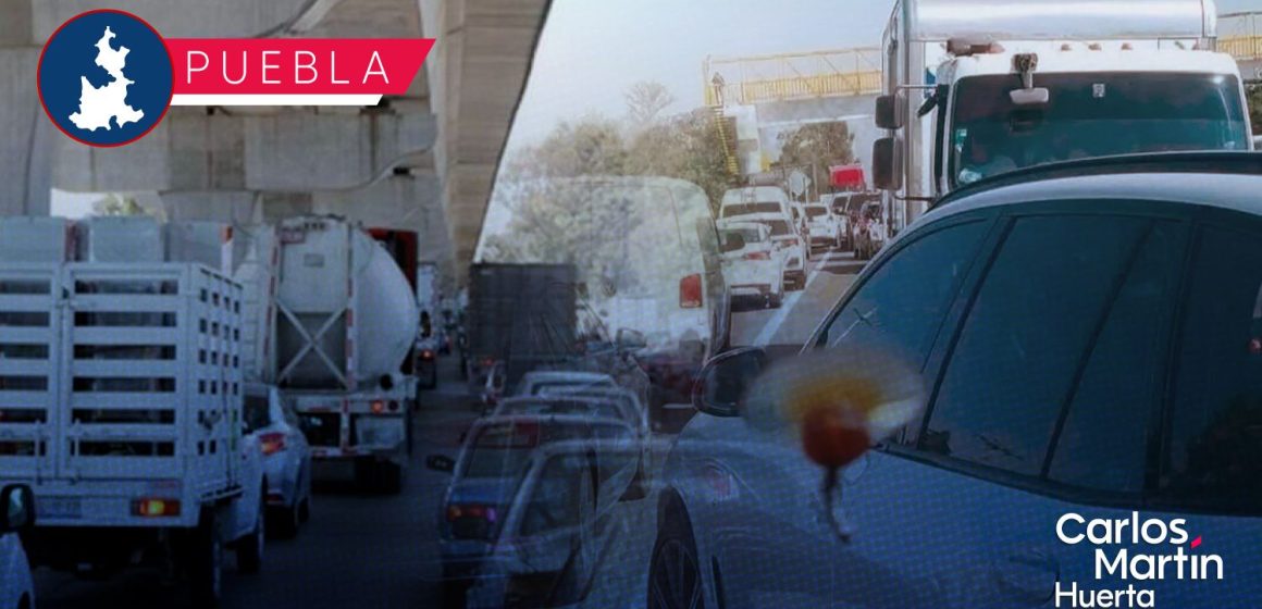 Por reducción de carriles, colapsa la autopista México-Puebla