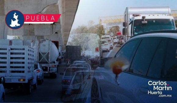 Por reducción de carriles, colapsa la autopista México-Puebla