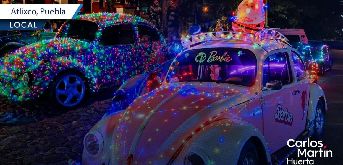 Caravana de vochos y combis iluminados llega a Puebla