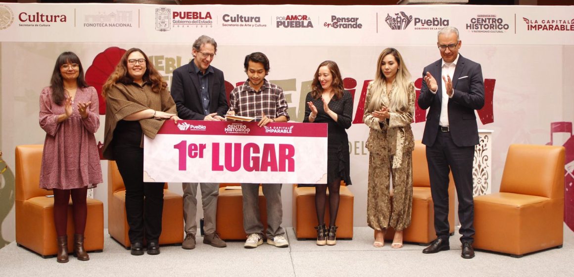 Portada Premian a las y los ganadores del concurso “Puebla Suena Postales Sonoras del Centro Histórico” CMH Premian a las y los ganadores del concurso “Puebla Suena: Postales Sonoras del Centro Histórico”