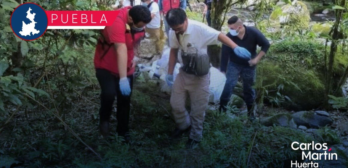 Localizan cuerpo en estado de descomposición en río de Hueytamalco
