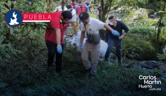 Localizan cuerpo en estado de descomposición en río de Hueytamalco