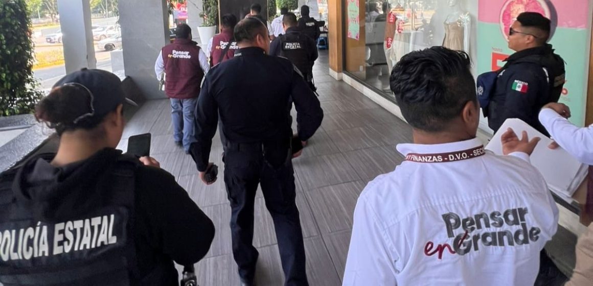 Colocan sellos en 52 bienes de Plaza Dorada por millonario adeudo fiscal