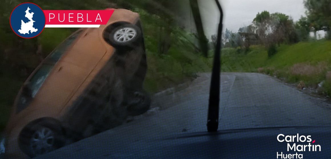 Lluvia provoca aparatosa volcadura en el Periférico Ecológico