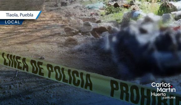 Localizan cuerpo embolsado en el municipio de Tlaola; autoridades investigan