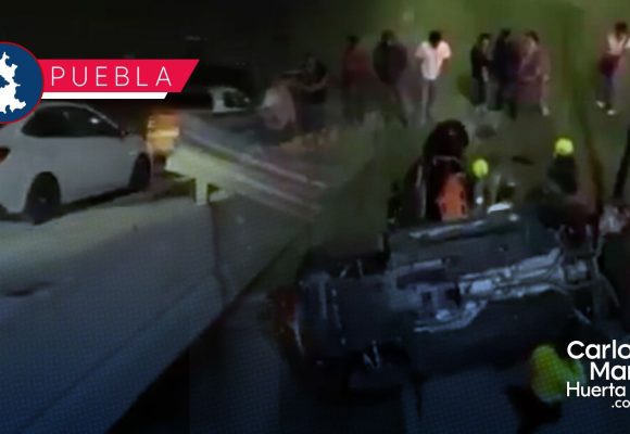 Cae vehículo Mercedes-Benz a paso deprimido en Lomas de Angelópolis III