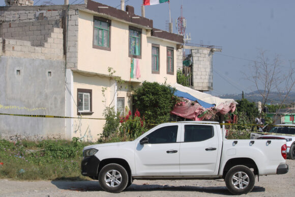 Asesinan a balazos a mujer en local de ropa en Santa Lucía